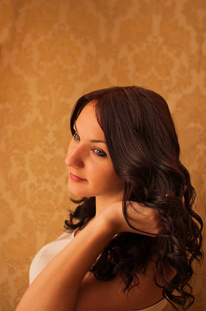 istock Young brunette girl indoor 481449995