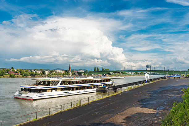 Passenger ship on River rhine and Kennedy Bridge in Bonn / Germany. It  is the middle of Bonn's three Rhine bridges.