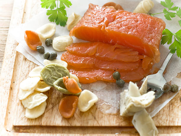 Gravlax Salty salmon on the old table gravad stock pictures, royalty-free photos & images