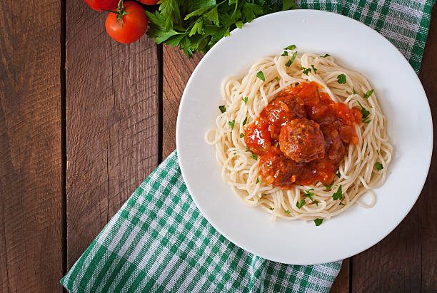 istock Pasta and meatballs with tomato sauce 481452864