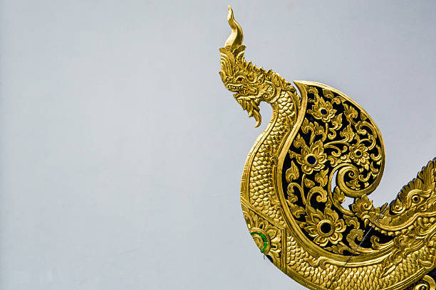 istock Golden wood naga sculpture 481452868