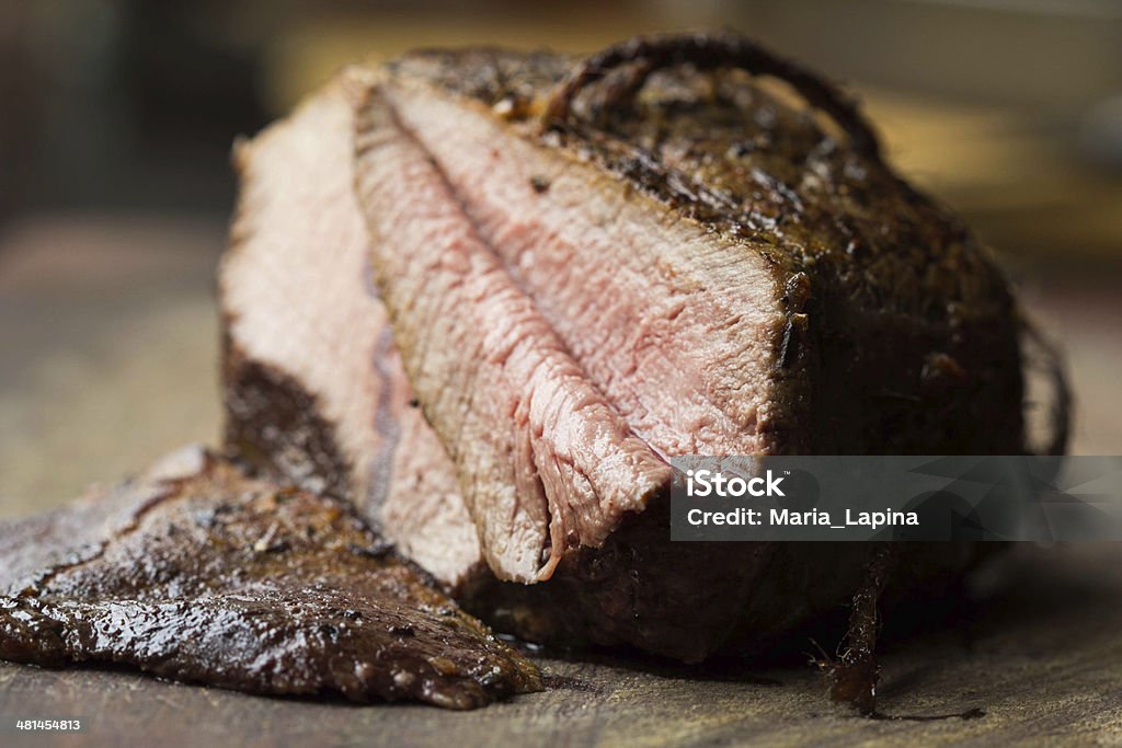 Piece of roasted beef, veal, cut in slices, delicious homemade Piece of roasted juicy beef, veal, cut in slices, delicious homemade dinner Asimo Stock Photo