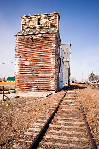 istock Forgotten Railroad Siding Train Tracks Wood Silo Building 481457320
