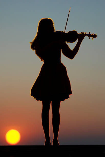 istock Young girl with violin 481459746