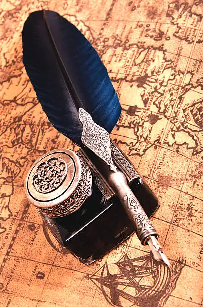 Photo of pen on an ancient map