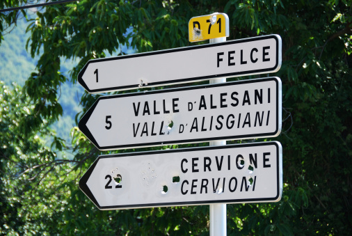 Shot holes in public road signs at La Castagniccia, Corsica, France