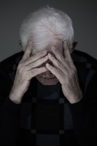Portrait of senior man suffering from deep depression