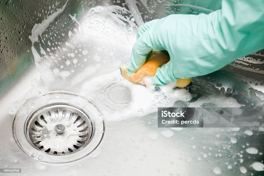 Scrubbing The Kitchen Sink Stock Photo - Download Image Now - Cleaning, Sink,  Kitchen Sink - iStock