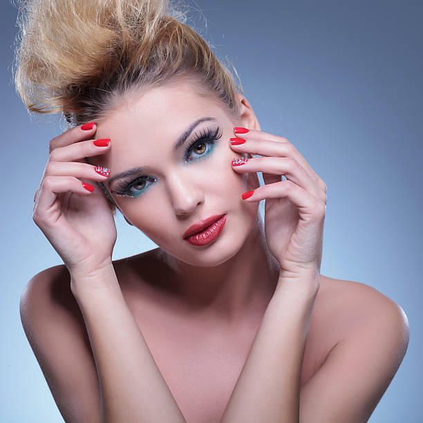istock classic pose of a beauty woman with hands on face 481465007