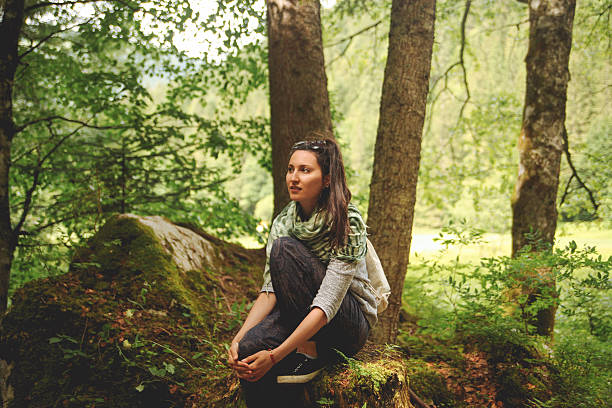 istock young brunette enjoys the nature 481466362