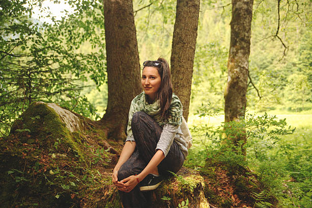 istock young brunette enjoys the nature 481466364