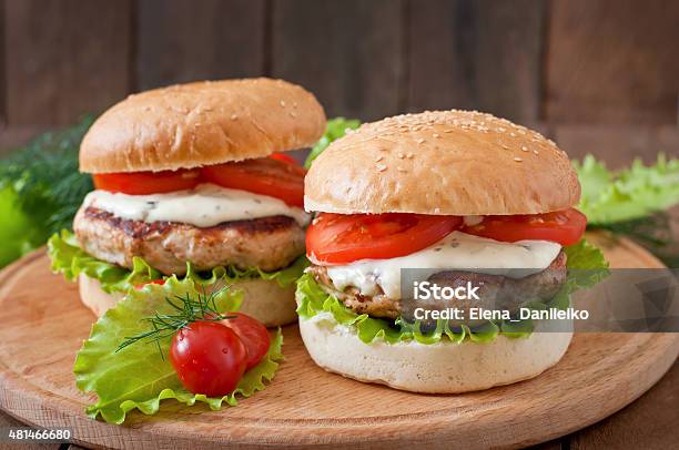 Appetizing Hamburger With Chicken Burger And Sauce Tartar Stock Photo - Download Image Now