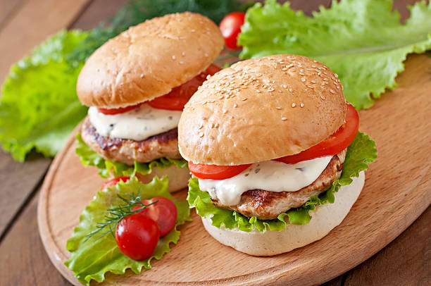 istock Appetizing hamburger with chicken burger and sauce Tartar 481466684