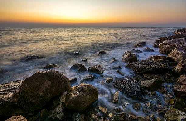 istock Beautiful sunset on beach with crashing waves. 481468004