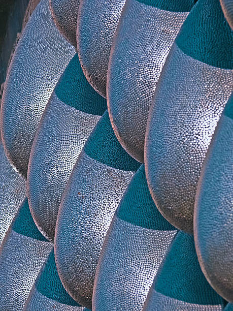 istock Steel sculpture represents Water Drops on Stone Wall 481471807