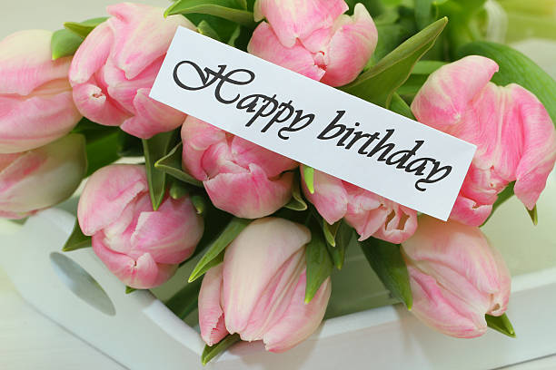 istock Happy birthday card with pink tulips 481477271
