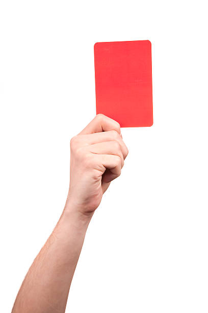 istock Soccer referee hand holding red card 481478614