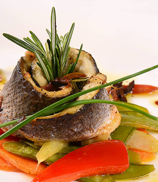 istock Sea bass fillet with spring vegetables 481478892