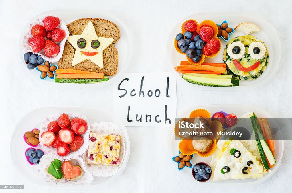 school lunch boxes for kids school lunch boxes for kids with food in the form of funny faces. the toning. selective focus Star Shape Stock Photo