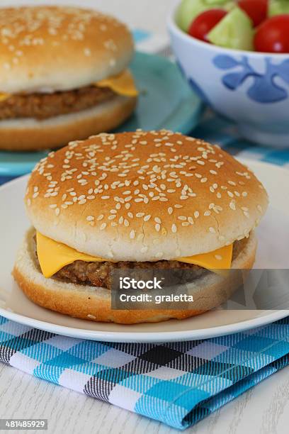 Cheeseburgers With Green Salad Stock Photo - Download Image Now - Beef, Blue, Brunch
