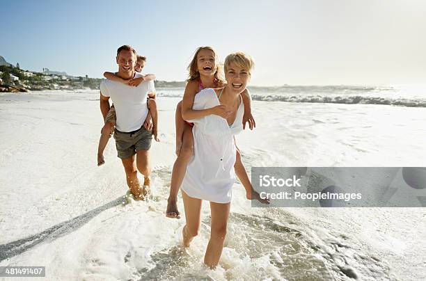 Go Faster Mom Were Beating Them Stock Photo - Download Image Now - Family, Beach, Summer