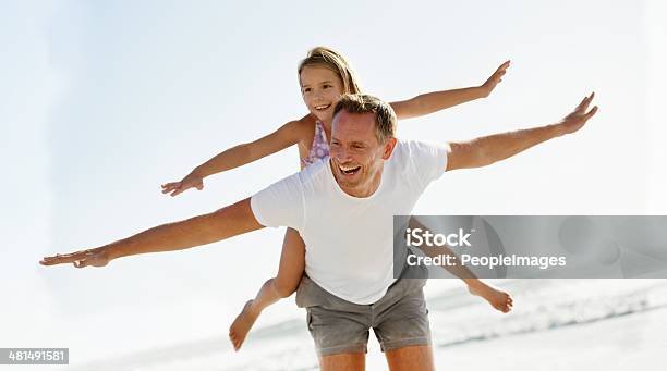 They Make A Good Team Stock Photo - Download Image Now - Father, Flying, Piggyback