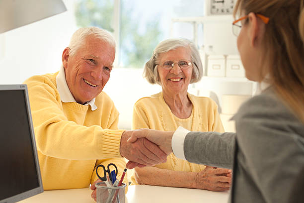 istock Elderly couple with consultant. 481493159