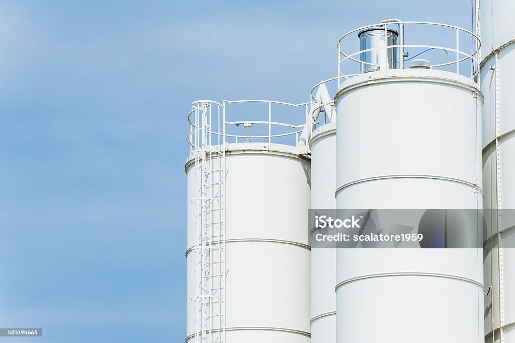 White silos White silos for the production of concrete Electric Mixer Stock Photo