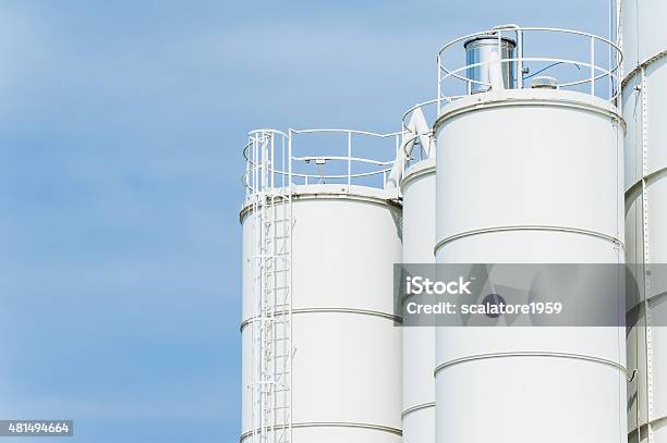 White Silos Stock Photo - Download Image Now - Electric Mixer, Refinery, 2015