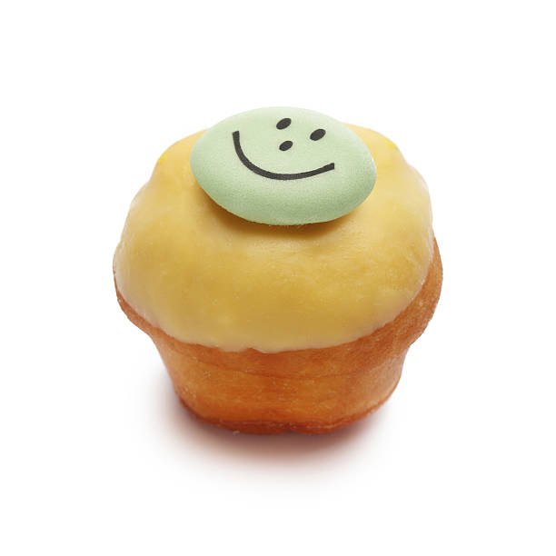 istock Small Cupcake Chocolate topping is smiling isolated on white background 481495334
