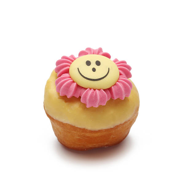 istock Small Cupcake Chocolate topping is smiling isolated on white background 481495338