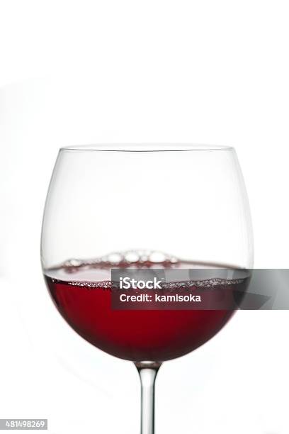 Foto de Vinho Tinto Em Um Vidro e mais fotos de stock de Bebida - Bebida, Bebida alcoólica, Comemoração - Conceito