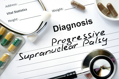 Diagnosis Progressive Supranuclear Palsy, pills and stethoscope.