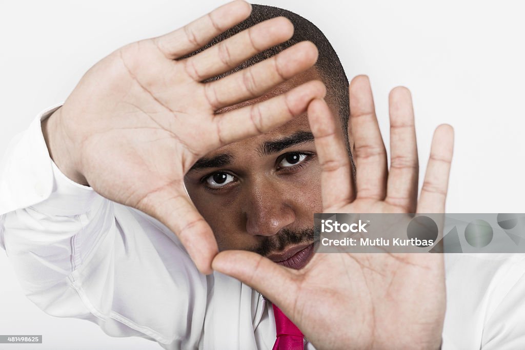Young black man looking http://www.istockphoto.com/file_thumbview_approve/29698962/3/stock-photo-29698962-confident-young-business-man-in-suit.jpg Adult Stock Photo