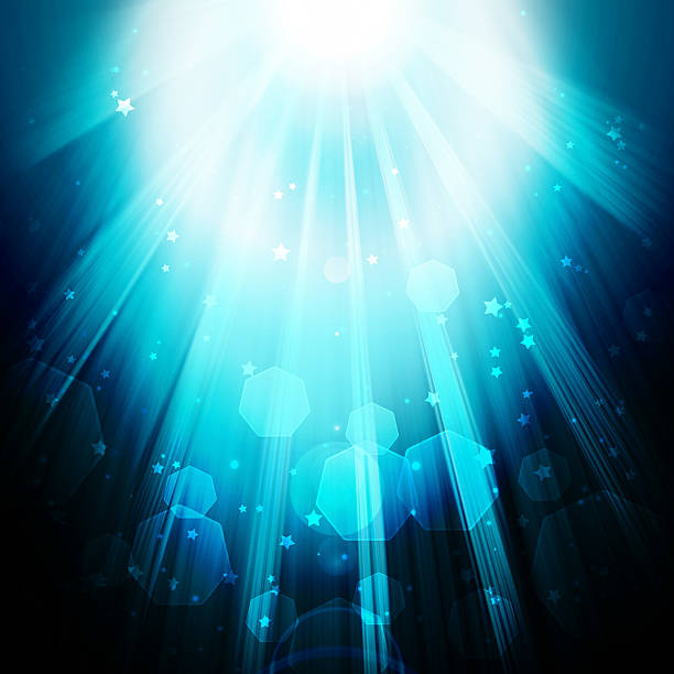 istock shining rays of glare and stars on a dark background 481500835