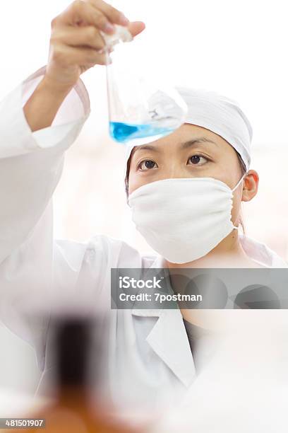 Young Microbiologist At Work Stock Photo - Download Image Now - Adult, Analyzing, Asian and Indian Ethnicities