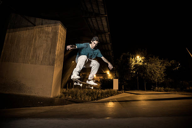 istock Young skateboarder in the city at night 481505514