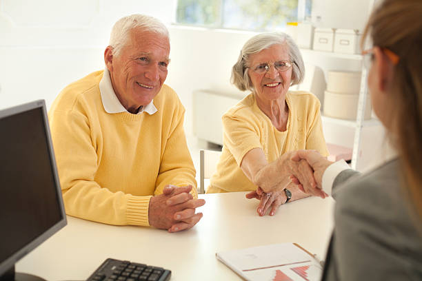 istock Senior couple with consultant. 481506917