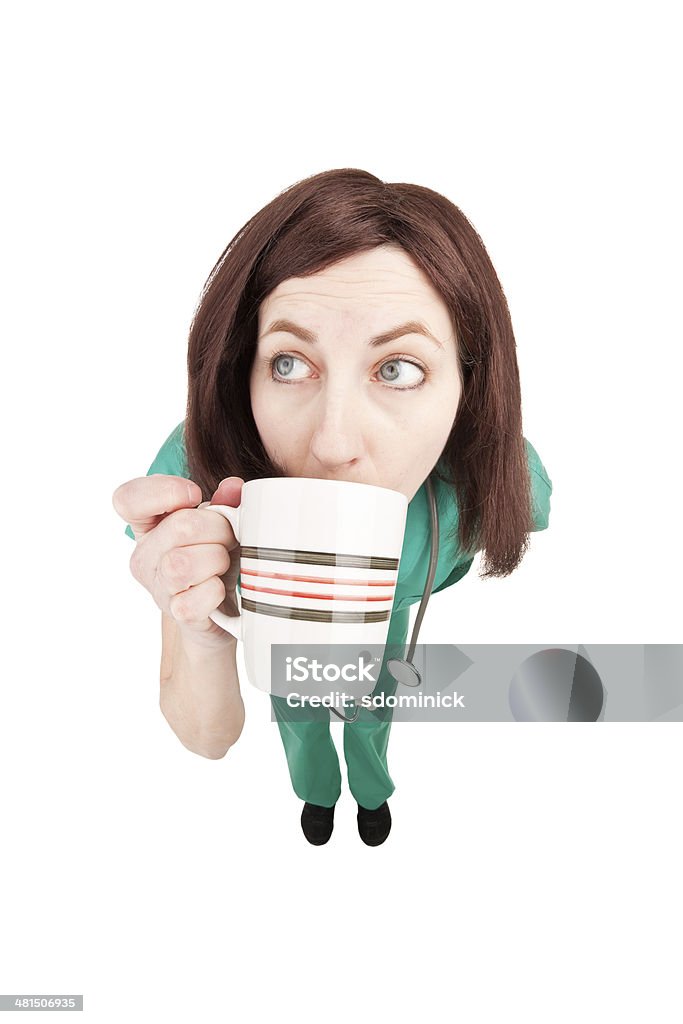 Fisheye Nurse Drinking Coffee A fisheye image of a nurse drinking a cup of coffee. Coffee - Drink Stock Photo