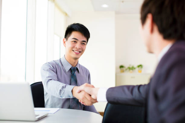 istock business man hand shaking in office 481507560