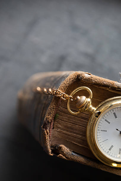 istock Vintage pocket watch old book 481507934