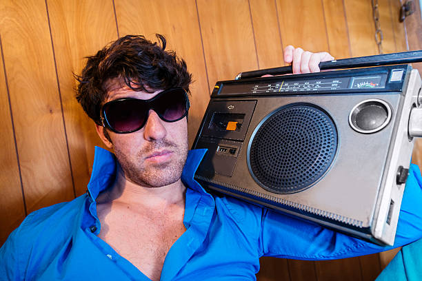 istock Man with Retro Radio Jamming Out 80s Style Music 481508311