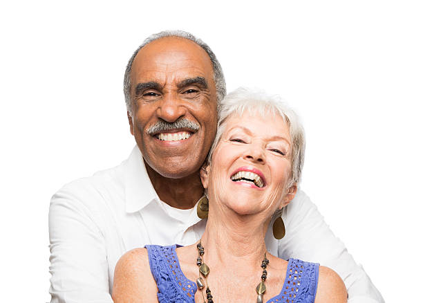 istock Cheerful latin couple facing forward and laughing 481509721