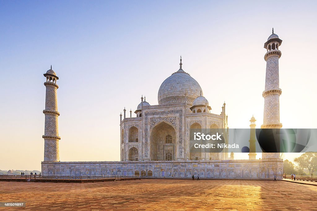 Taj Mahal, ao pôr-do-sol - Foto de stock de Taj Mahal royalty-free