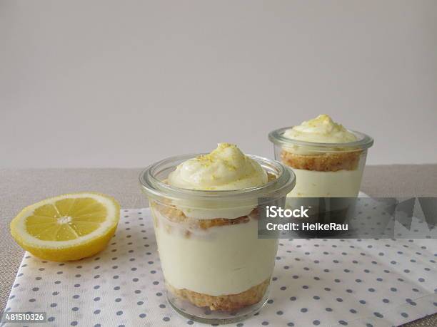 Lemon Curd Cream Cake In Glass Stock Photo - Download Image Now - Lemon Cheesecake, Lemon Cake, Drinking Glass