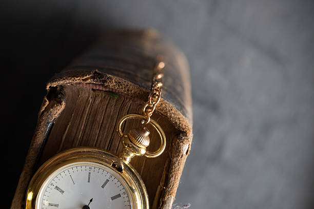 istock Vintage pocket watch old book 481510580