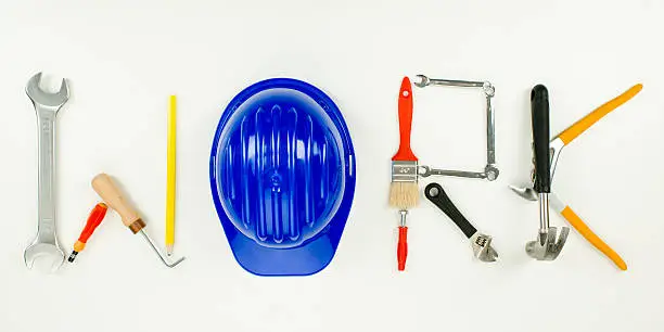 work word written with construction tools on white background
