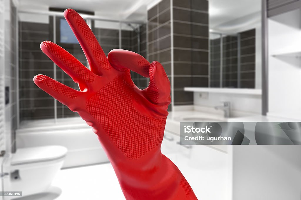 Ok sign Hand ok sign on bathroom background Bathtub Stock Photo