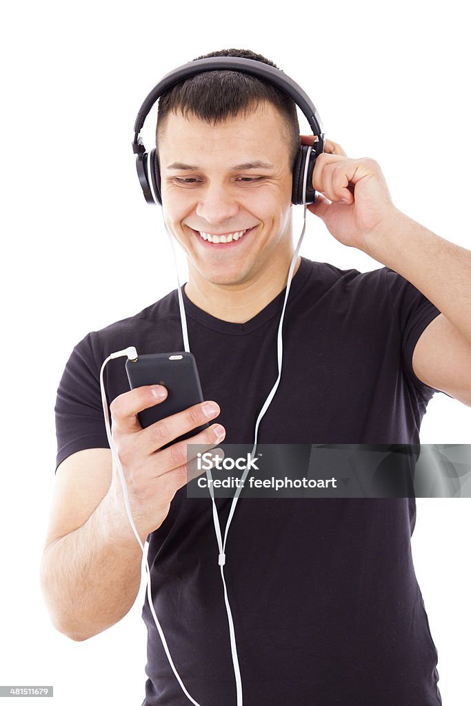 sexy homem ouvindo mp3 player com fones de ouvido - Foto de stock de Adulto royalty-free