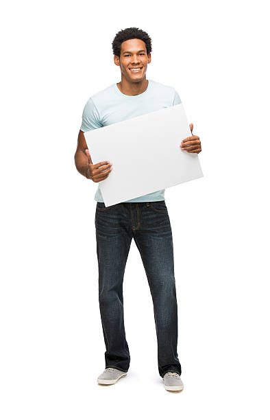 casual hombre joven latina sosteniendo señal - black sign holding vertical fotografías e imágenes de stock